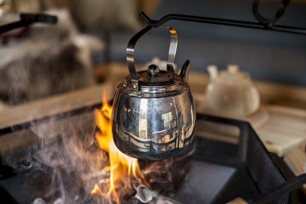 kettle over fire in BBQ hut