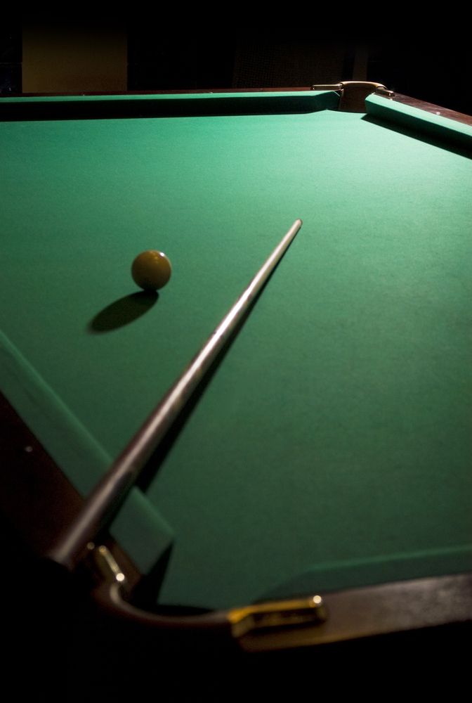 Pool Table With A Ball and Cue On It — Eight Ball Services In Taranganba, QLD