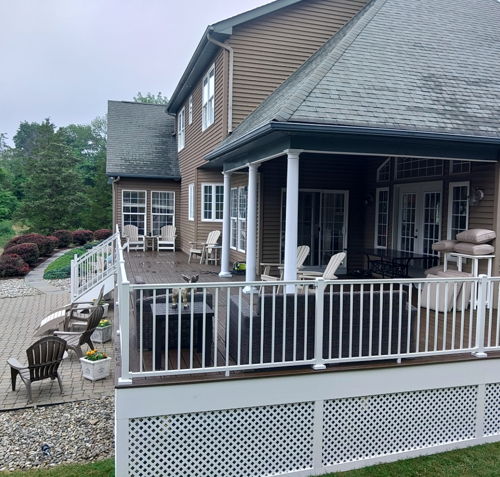 A large house with a porch and a sign that says aerate