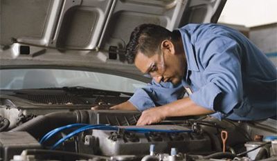 Vehicle Parts— Auto Mechanic Fixing The Car Engine in Cleveland, OH