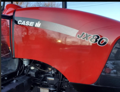 Red Case IH JX80 tractor hood with branding and silver stripe.