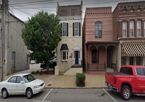 Office With 2 Cars— Owensboro, KY—Thacker Hodskins & Knight LLP