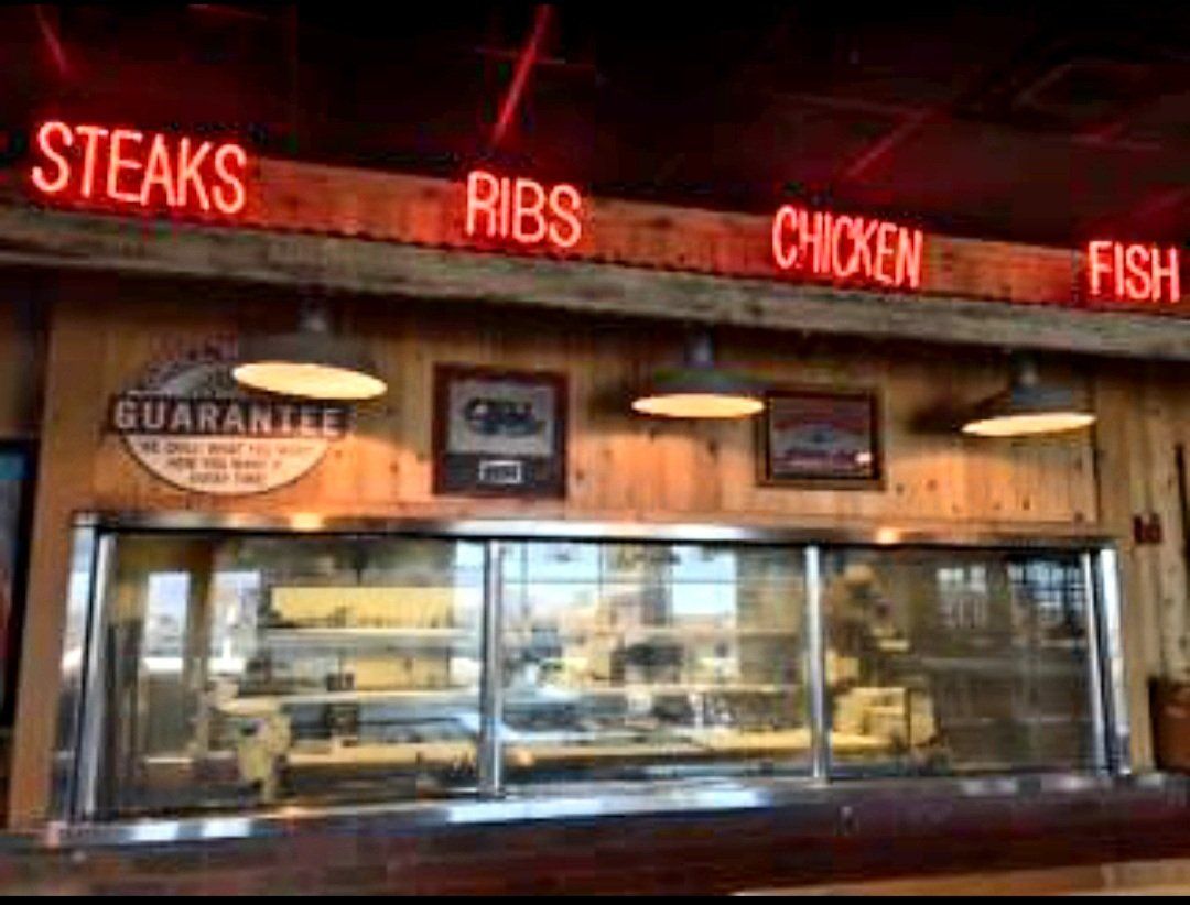 A restaurant serving steaks , ribs , chicken and fish.
