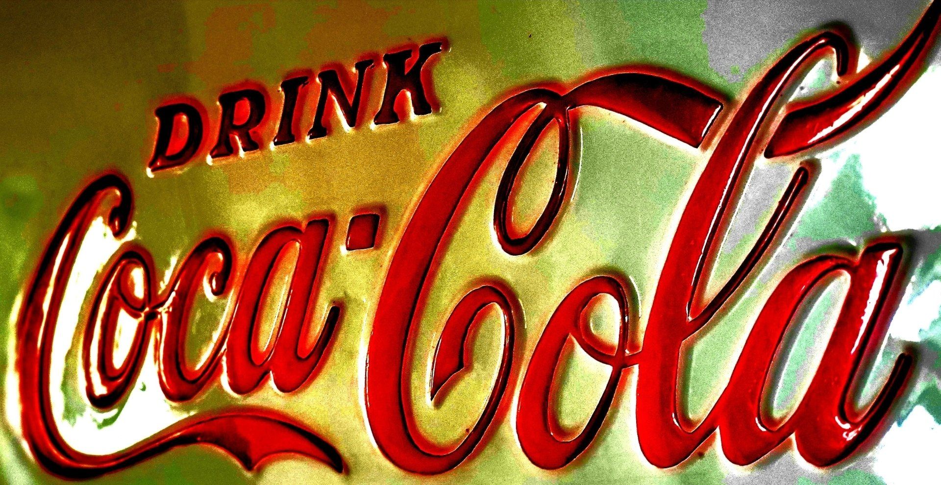 A sign that says drink coca cola on it