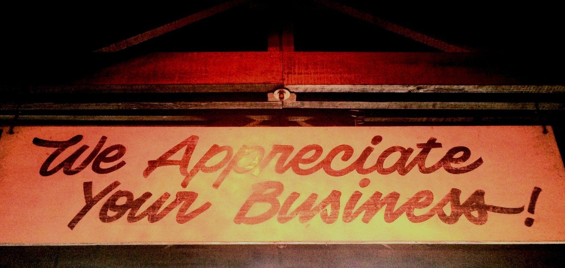 A sign that says we appreciate your business on it