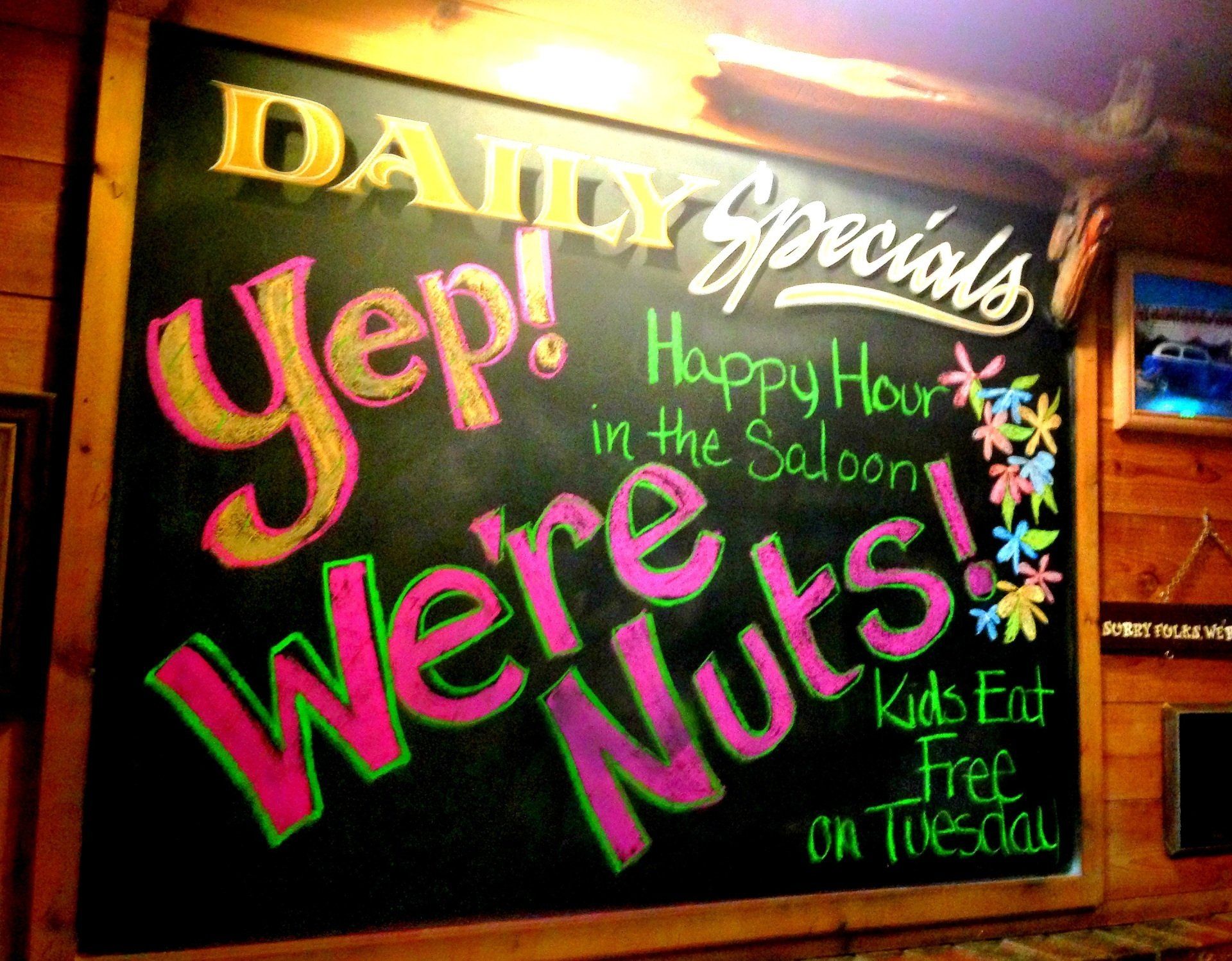A chalkboard that says daily specials on it