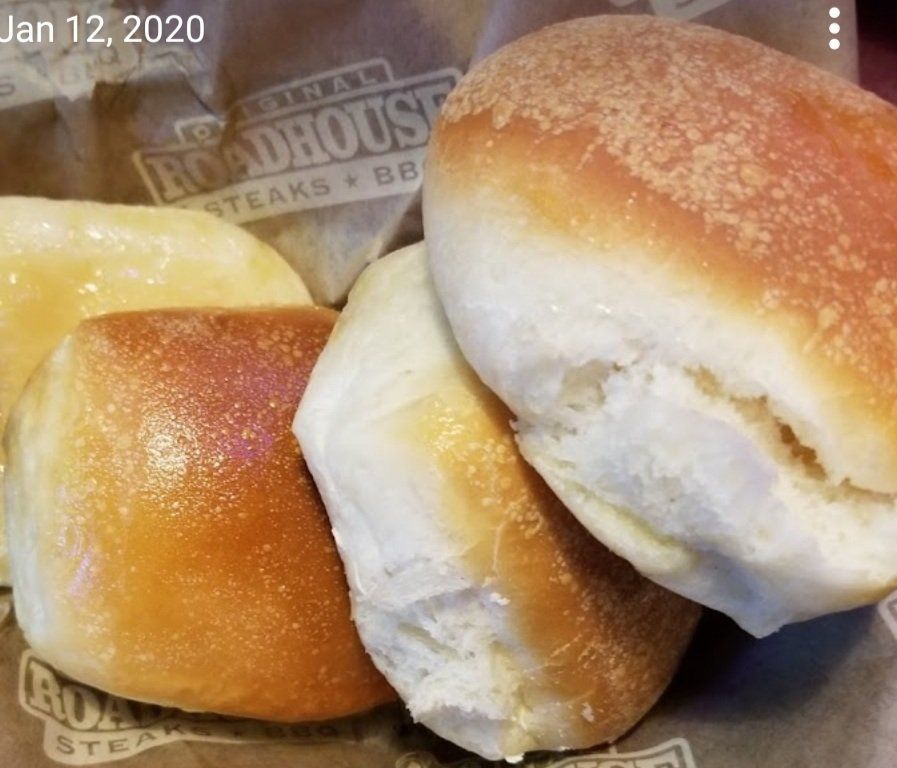 A bunch of rolls from roadhouse steaks and bbq