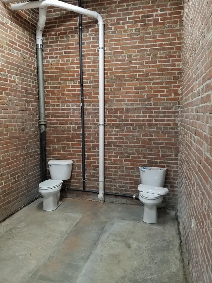 Installed Toilets — Dothan, AL — White Plumbing & Electrical Co Inc