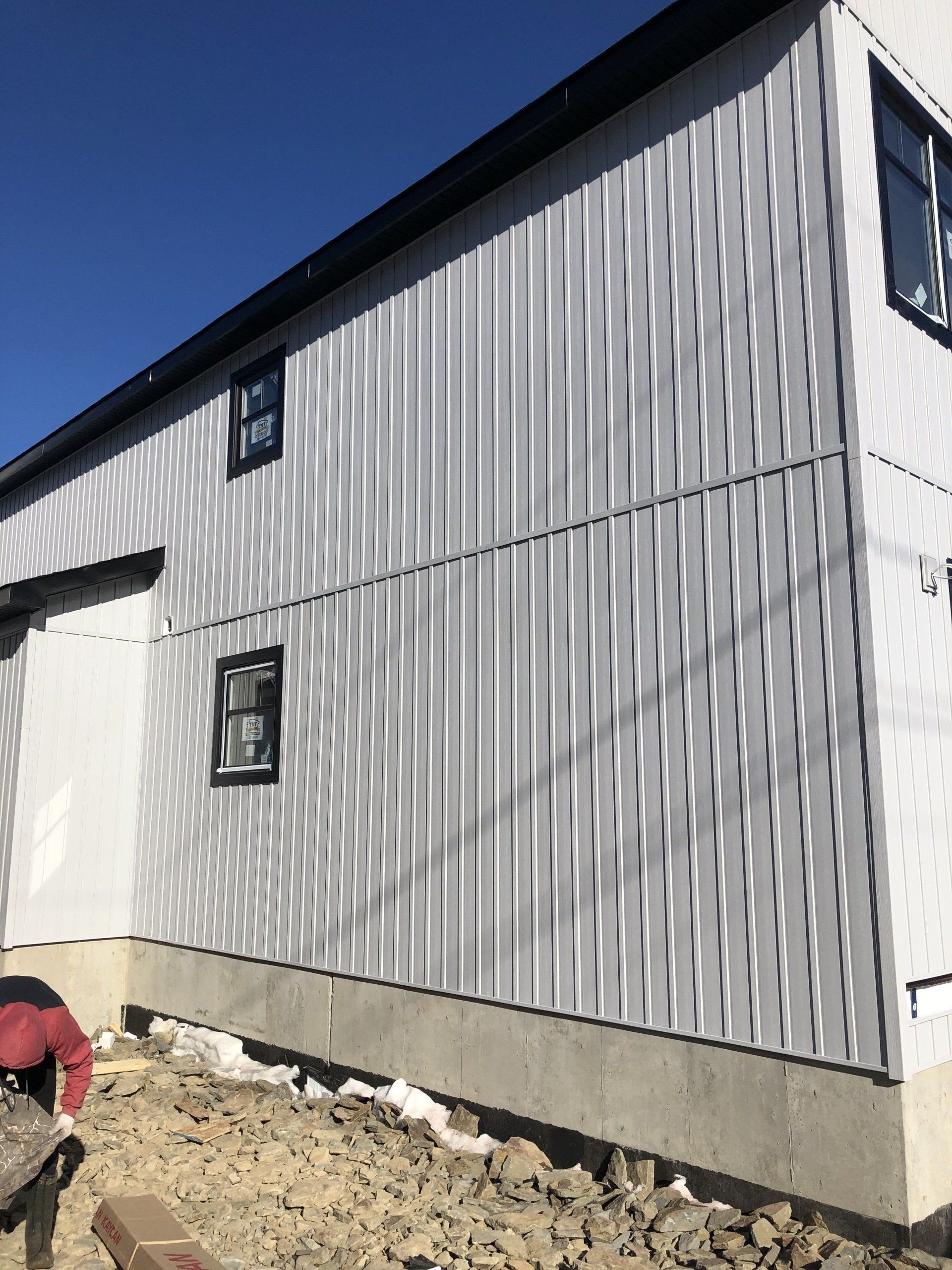 A large white building with a lot of windows