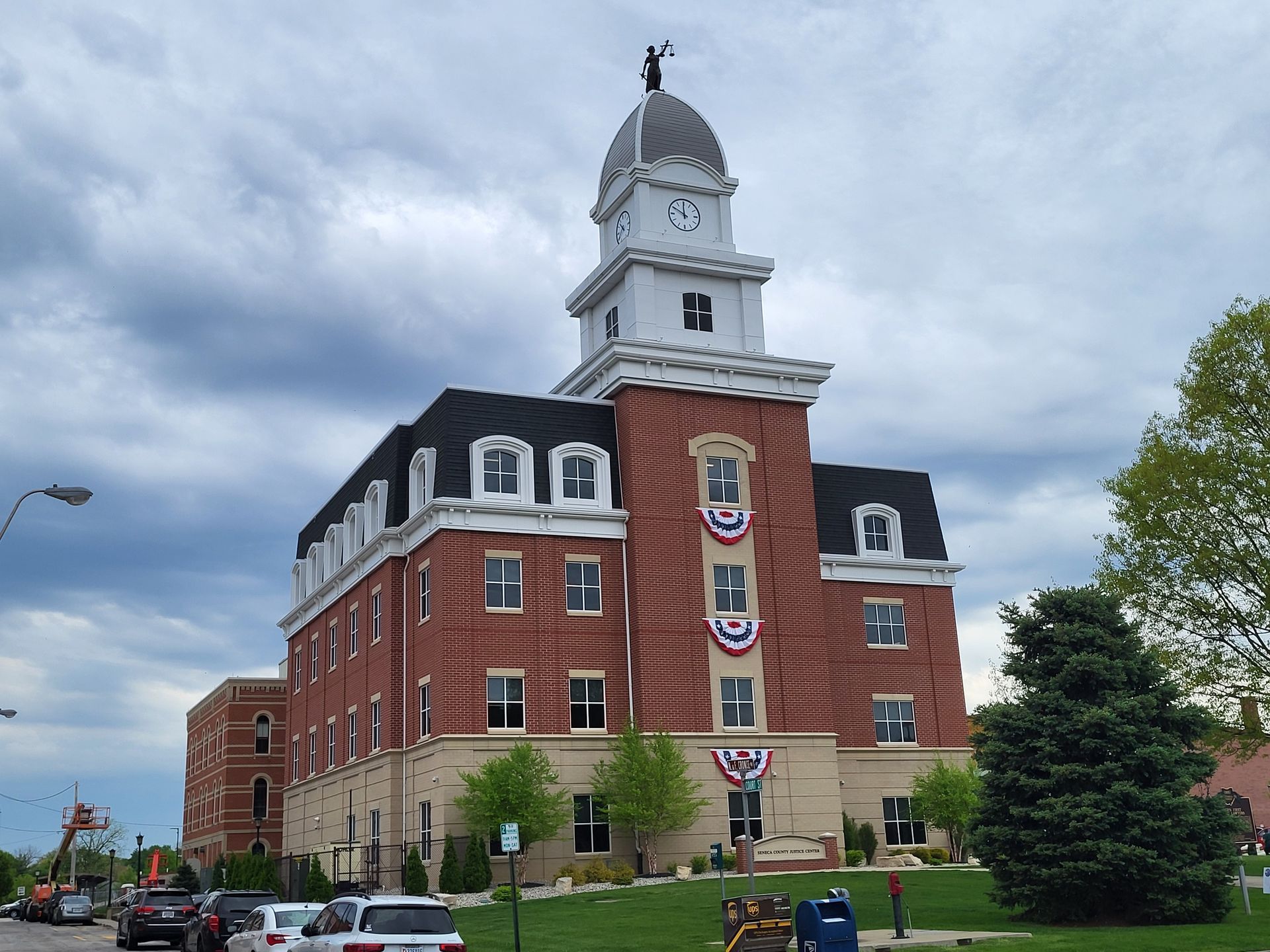 A large brick building with a clock tower on top of it