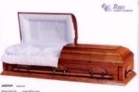 wooden casket with white liner.