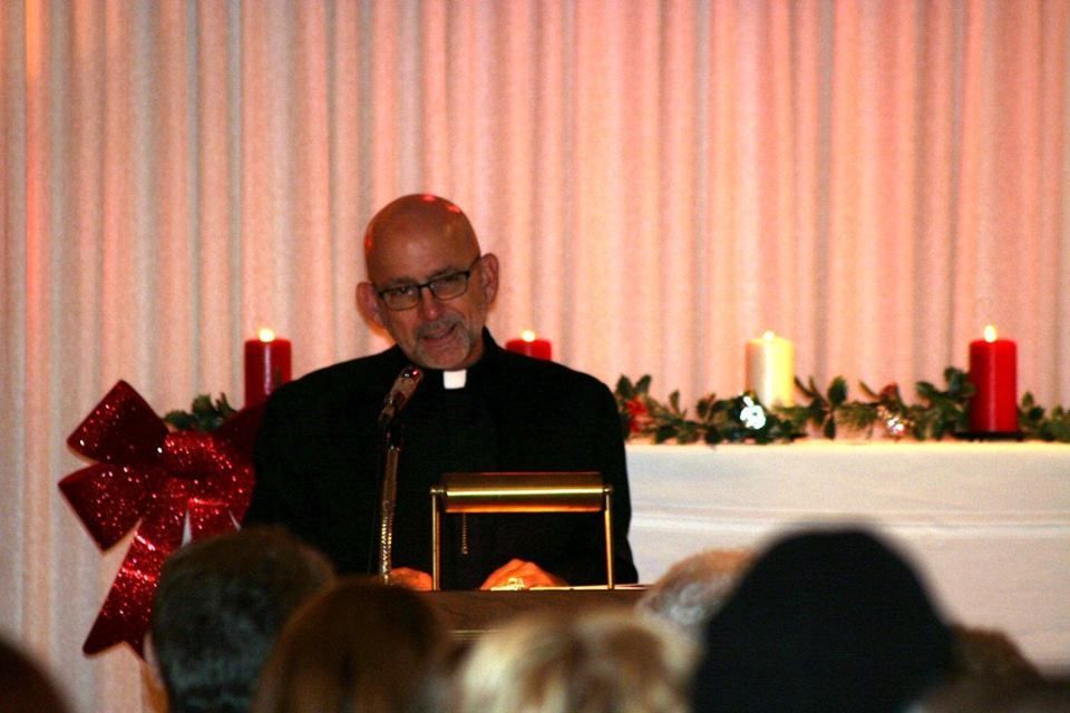 Man giving speech at Christmas