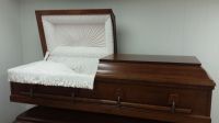 Deep cherry wood casket with white liner