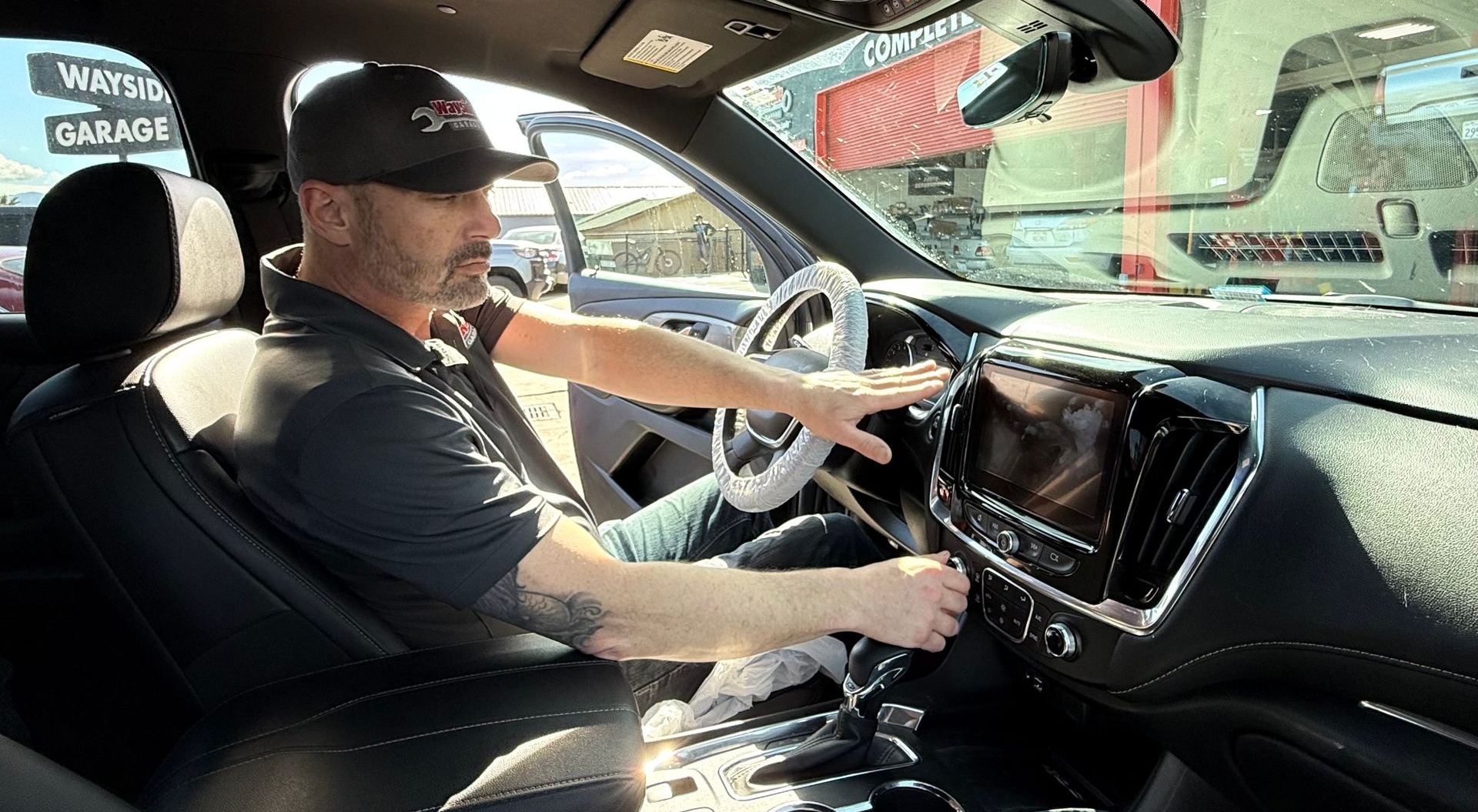 Technician diagnosing car AC problem in Monterey CA at Wayside Garage
