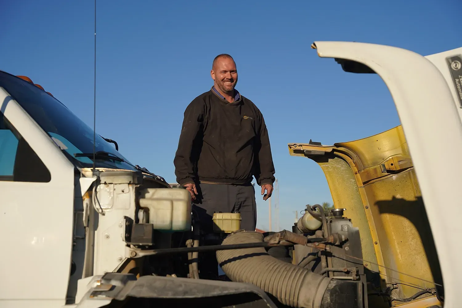 Staff performing repairs on truck | Chickasaw Garage