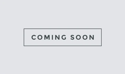 A button that says `` coming soon '' on a white background.