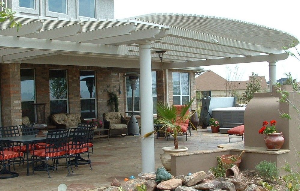 Alumawood pergola with curved design in Conroe, TX.