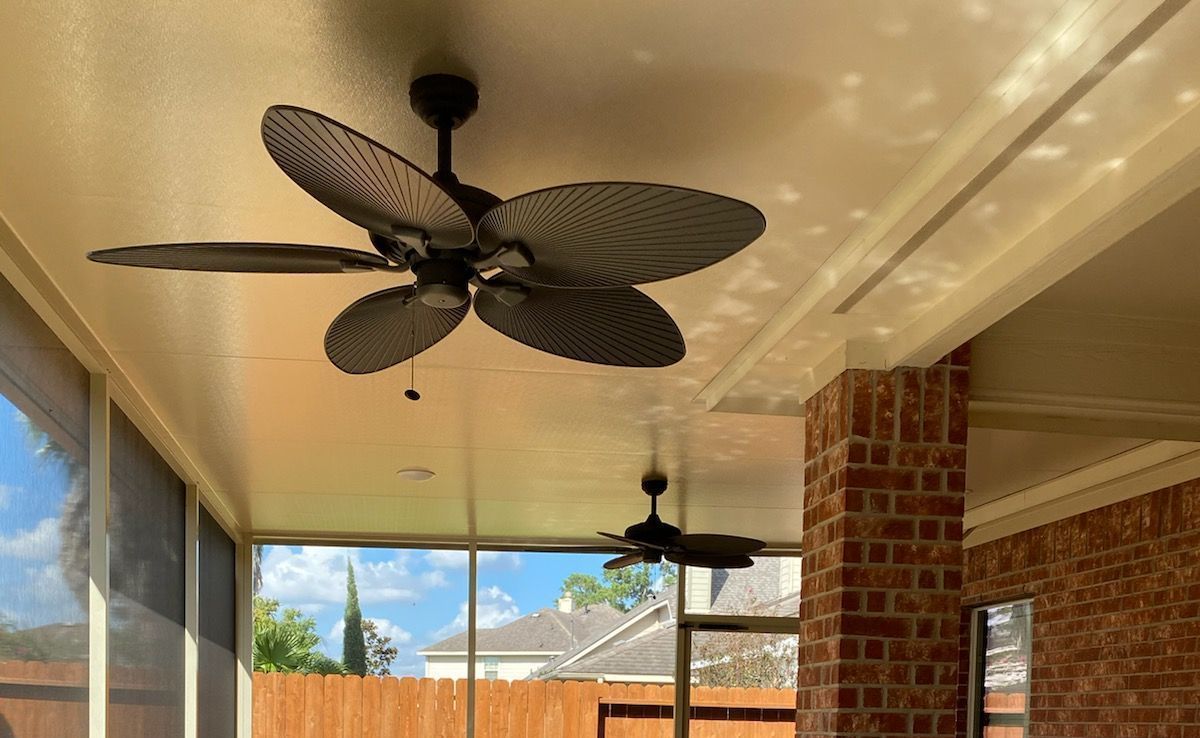 Screen room enclosure in Cypress TX with white framing and bug-resistant mesh