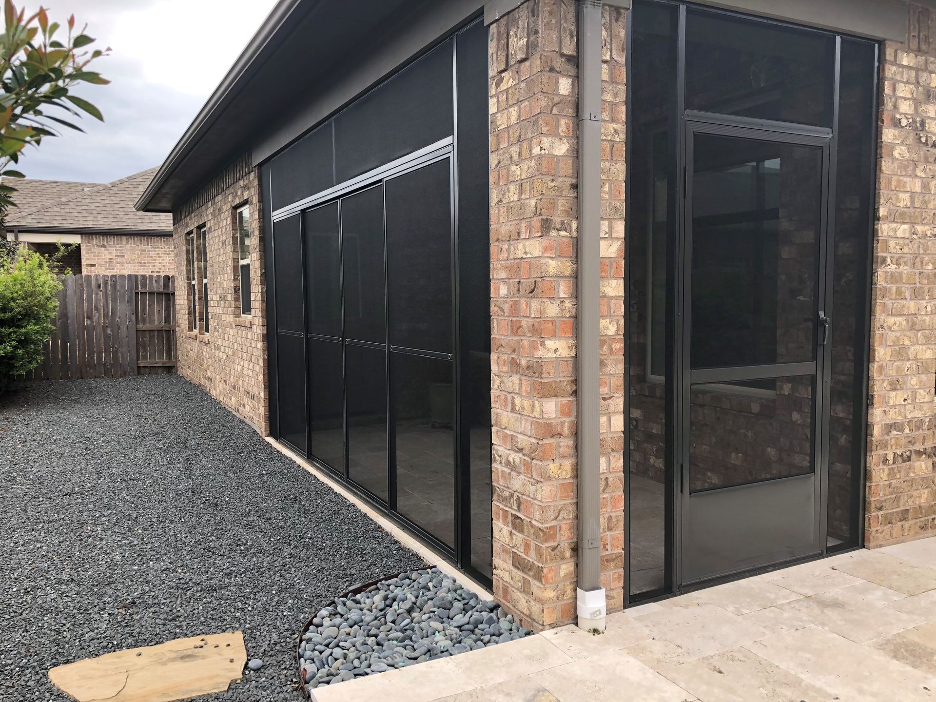 Example of a double sliding screen door on a new patio.