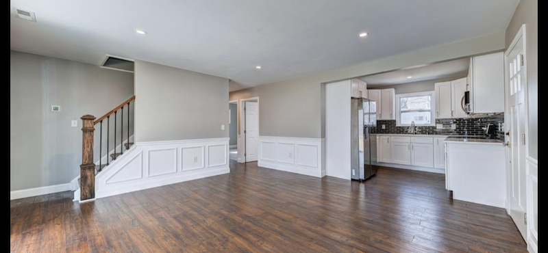 hardwood floor installed in living room and kitchen