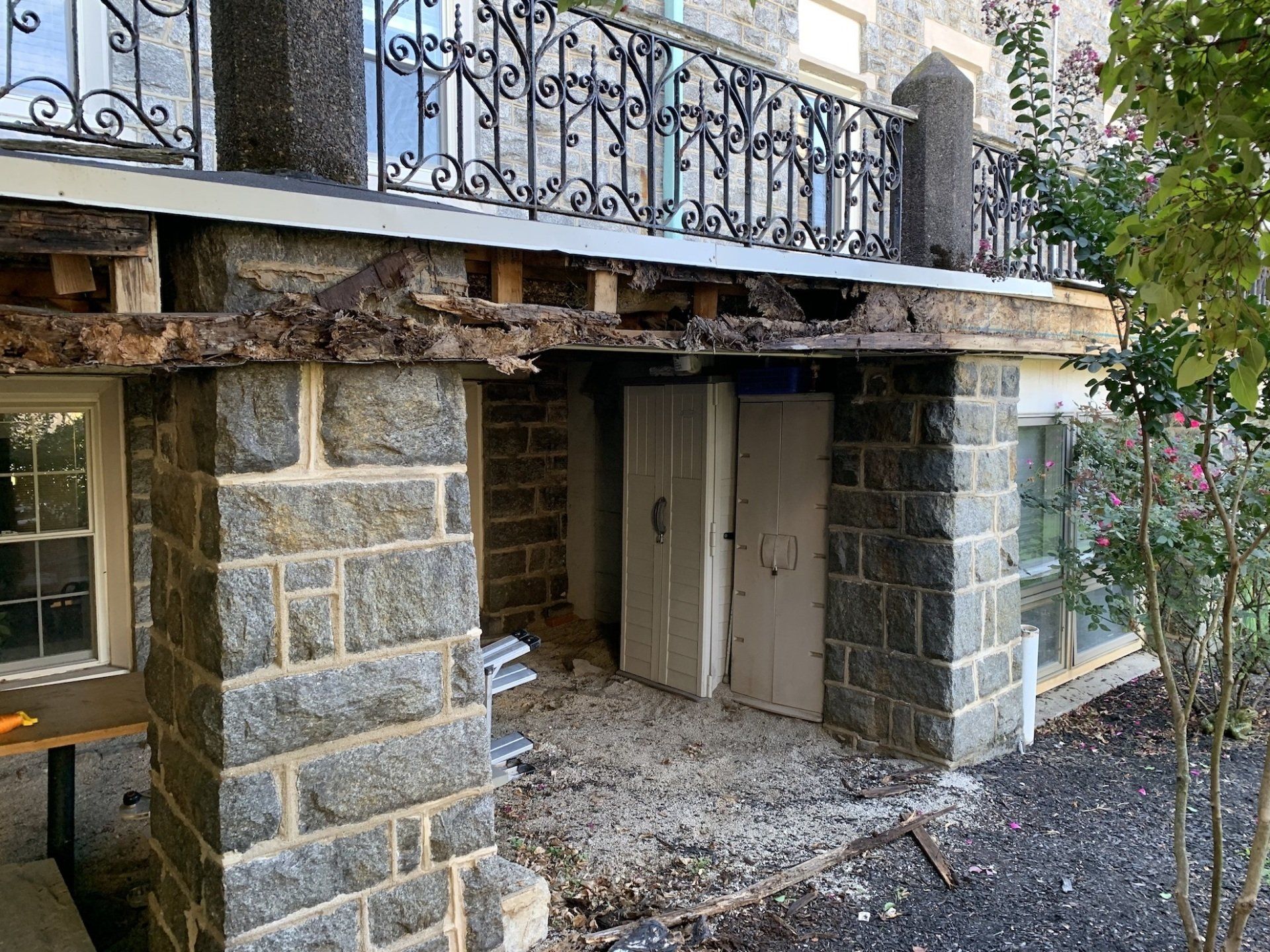 renovation of elevated deck and railing in progress replacing wood beam