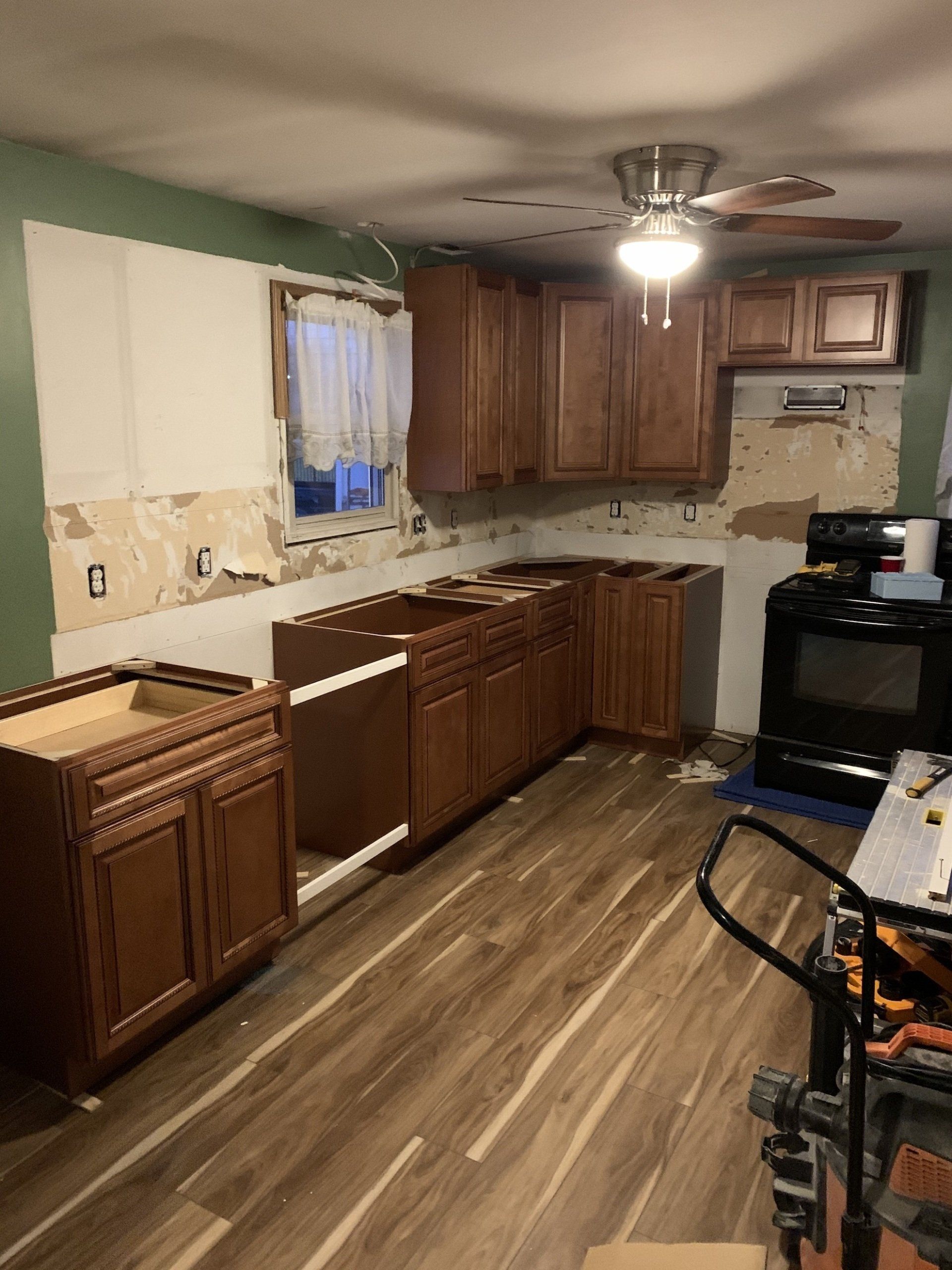 kitchen remodel with brown wood cabinets