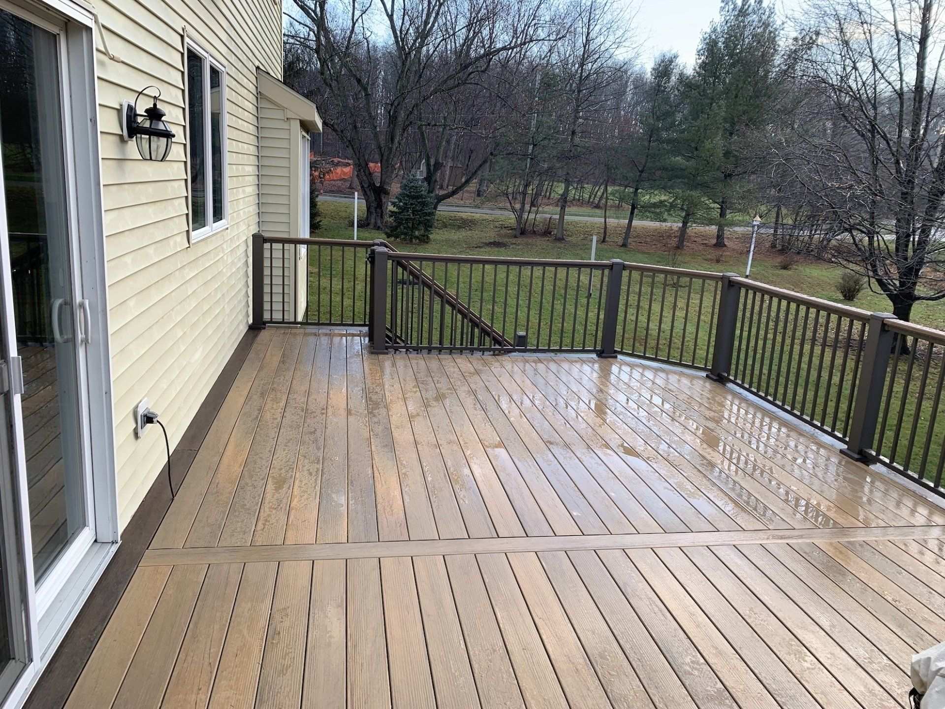 completed elevated wood decking with stairs