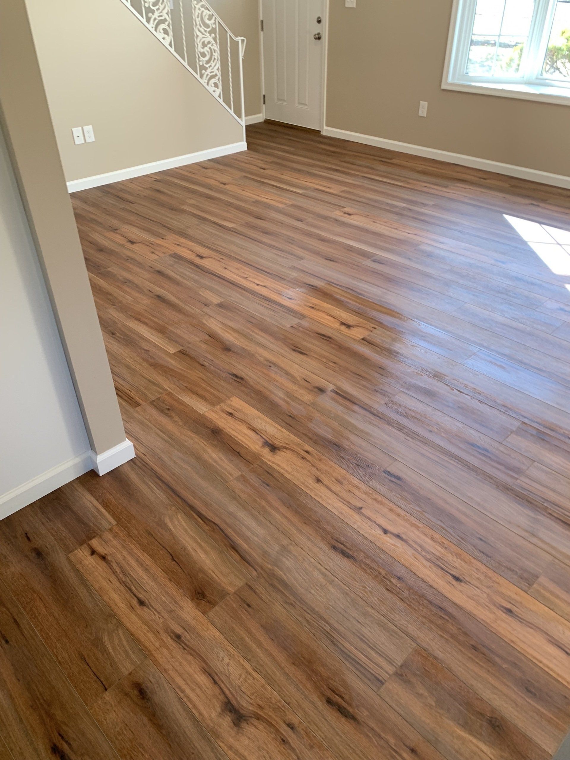 hardwood floors installed throughout the main level of the house