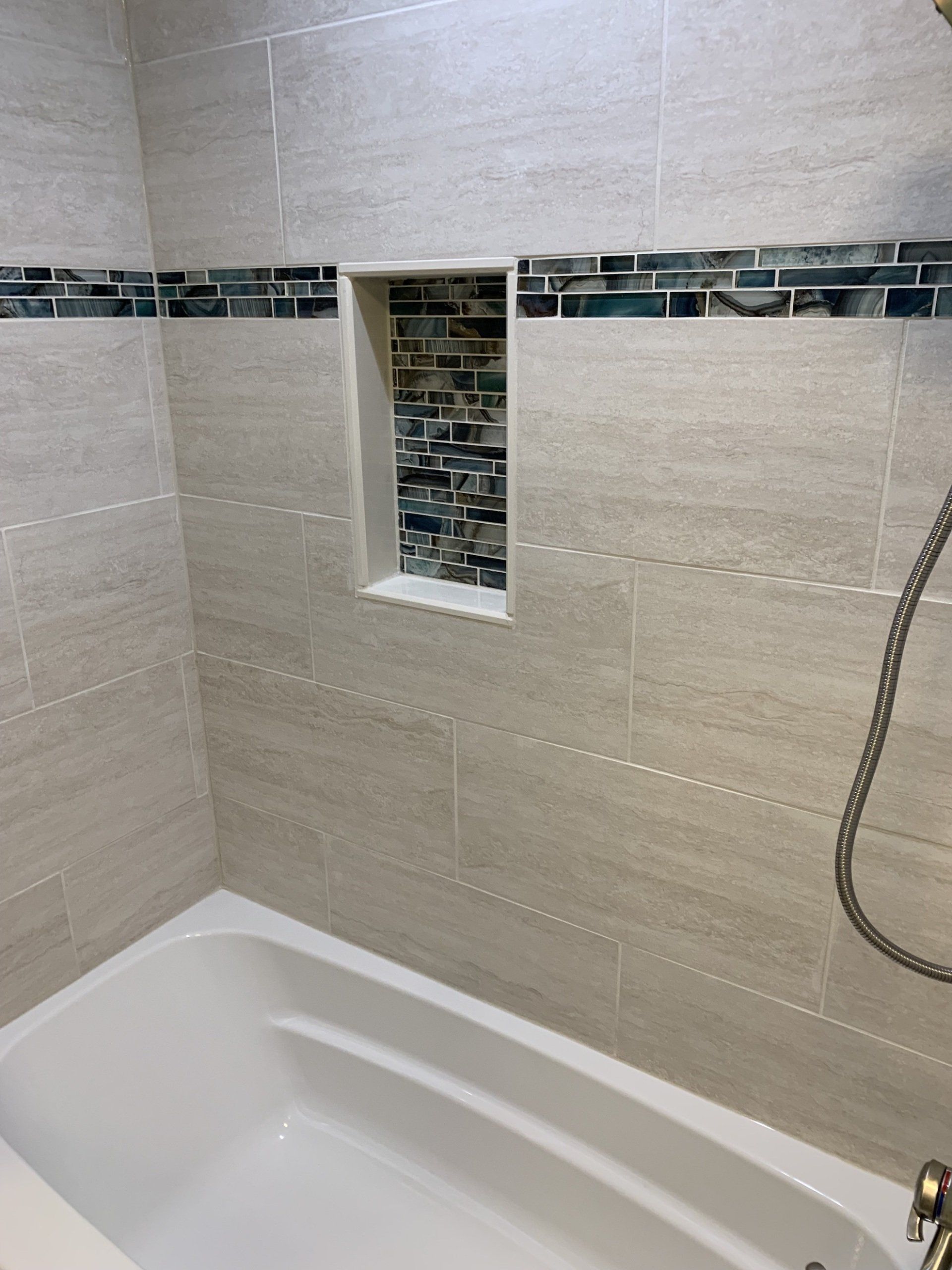 bathroom renovation tiled cutout and new tub
