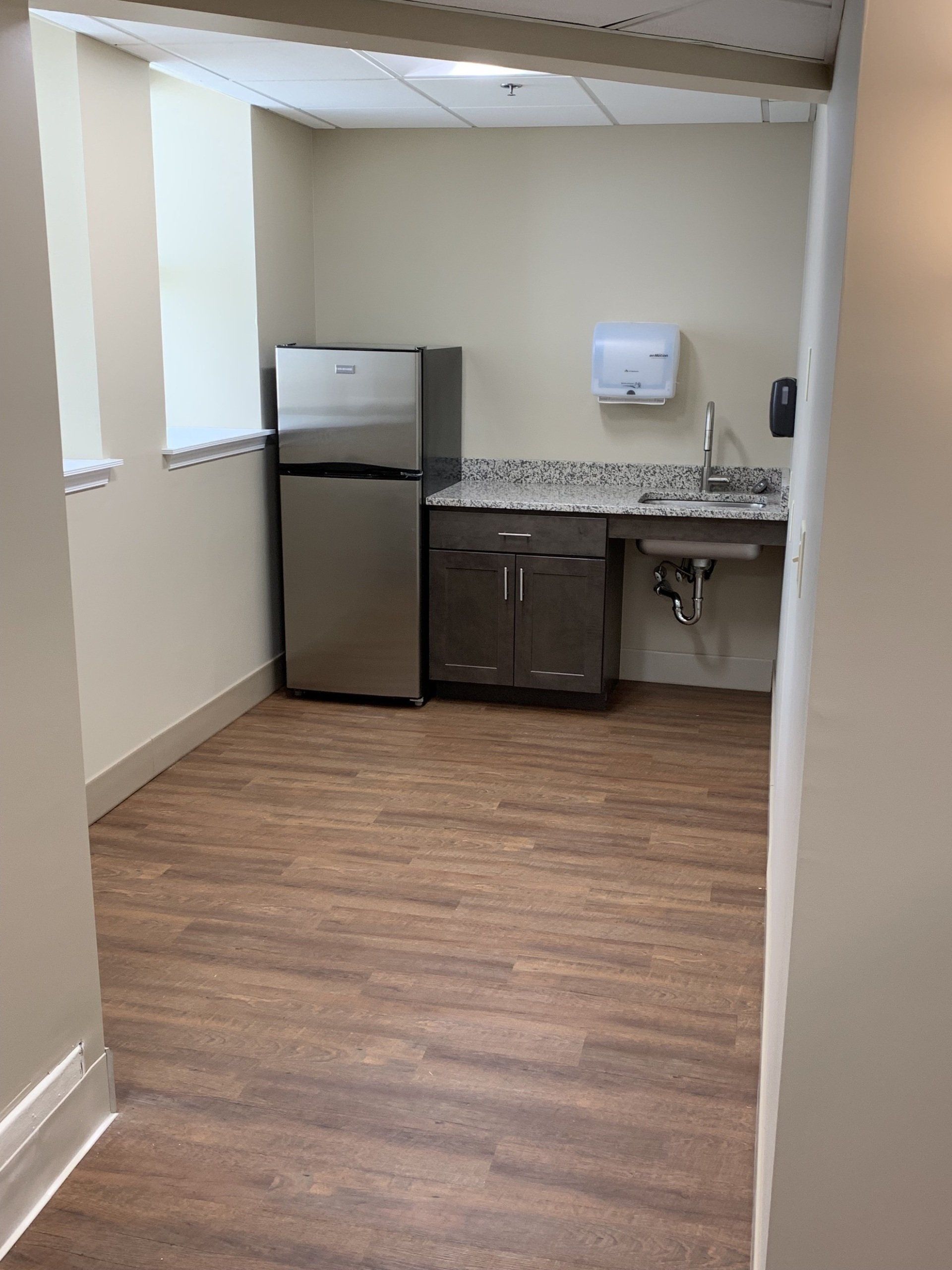 hardwood floor installed in kitchen space
