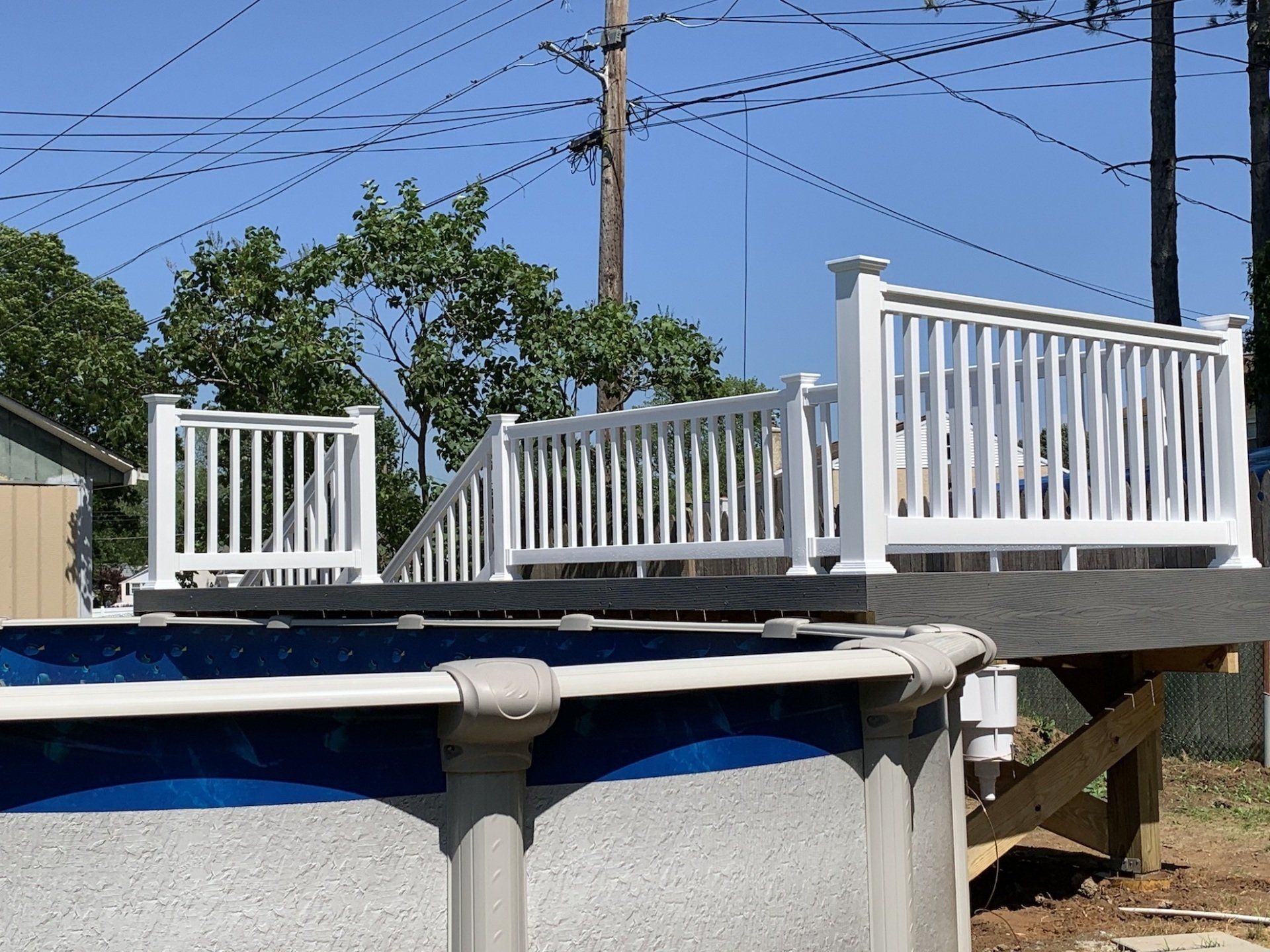 new deck installation around pool view