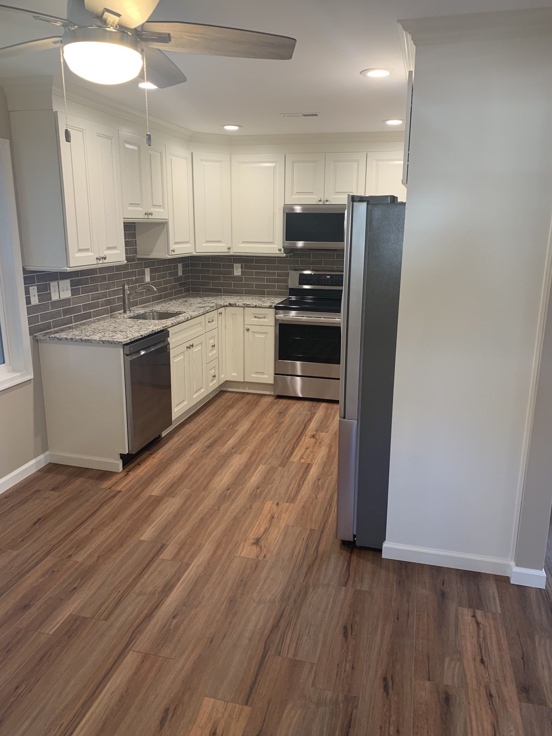 hardwood floor installed in kitchen
