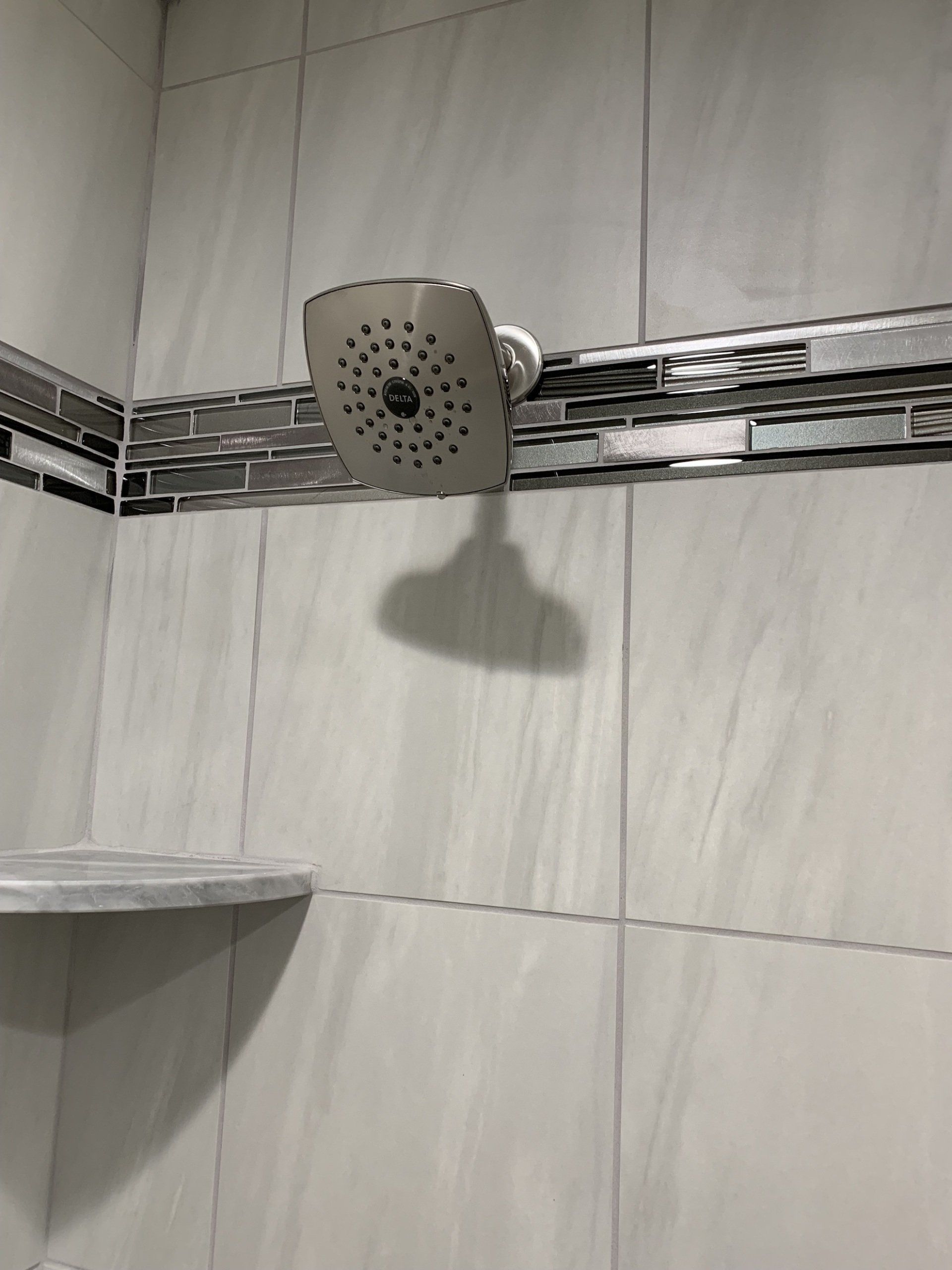 new shower head in bathroom
