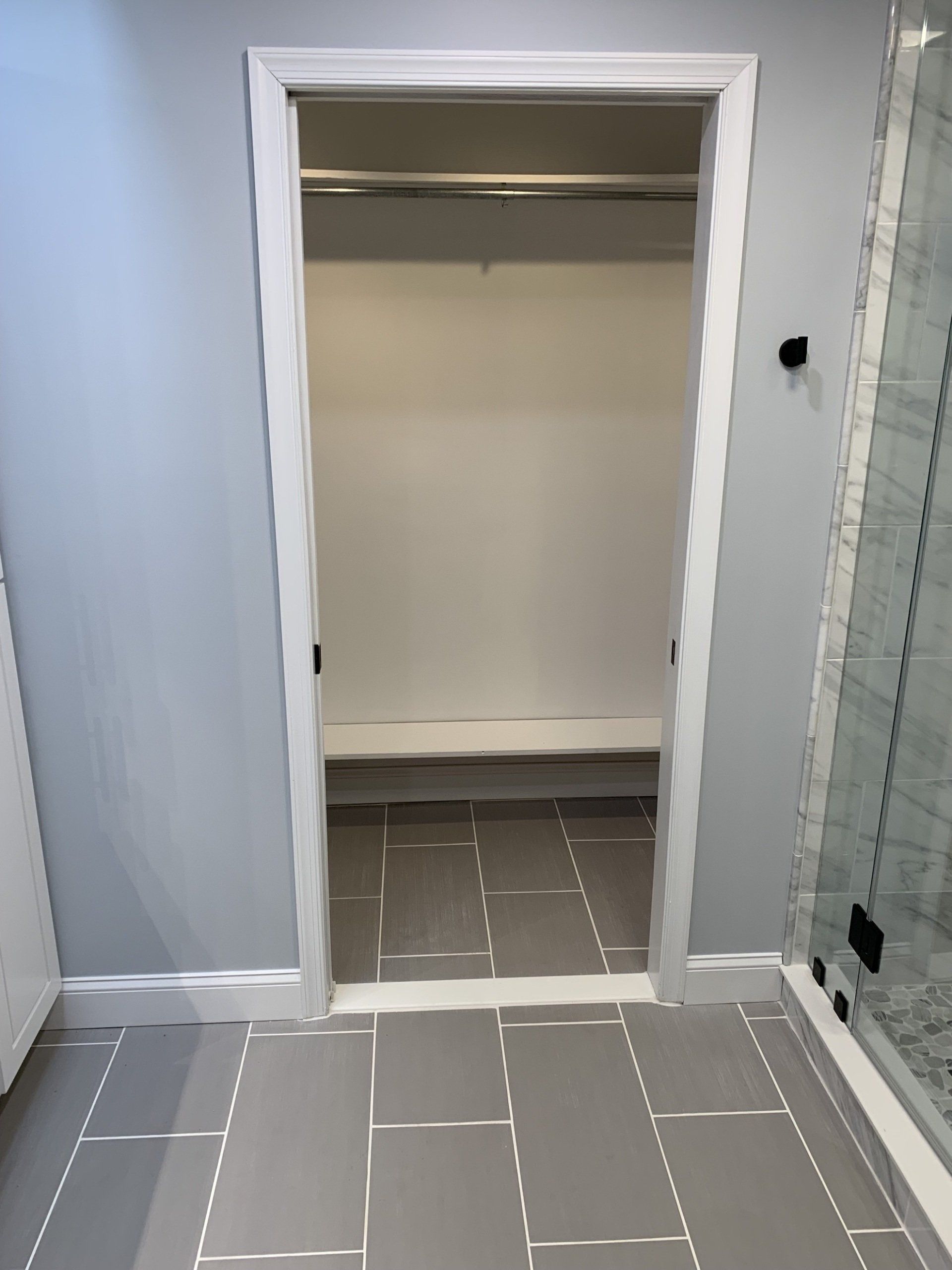 bathroom renovation with new tile flooring