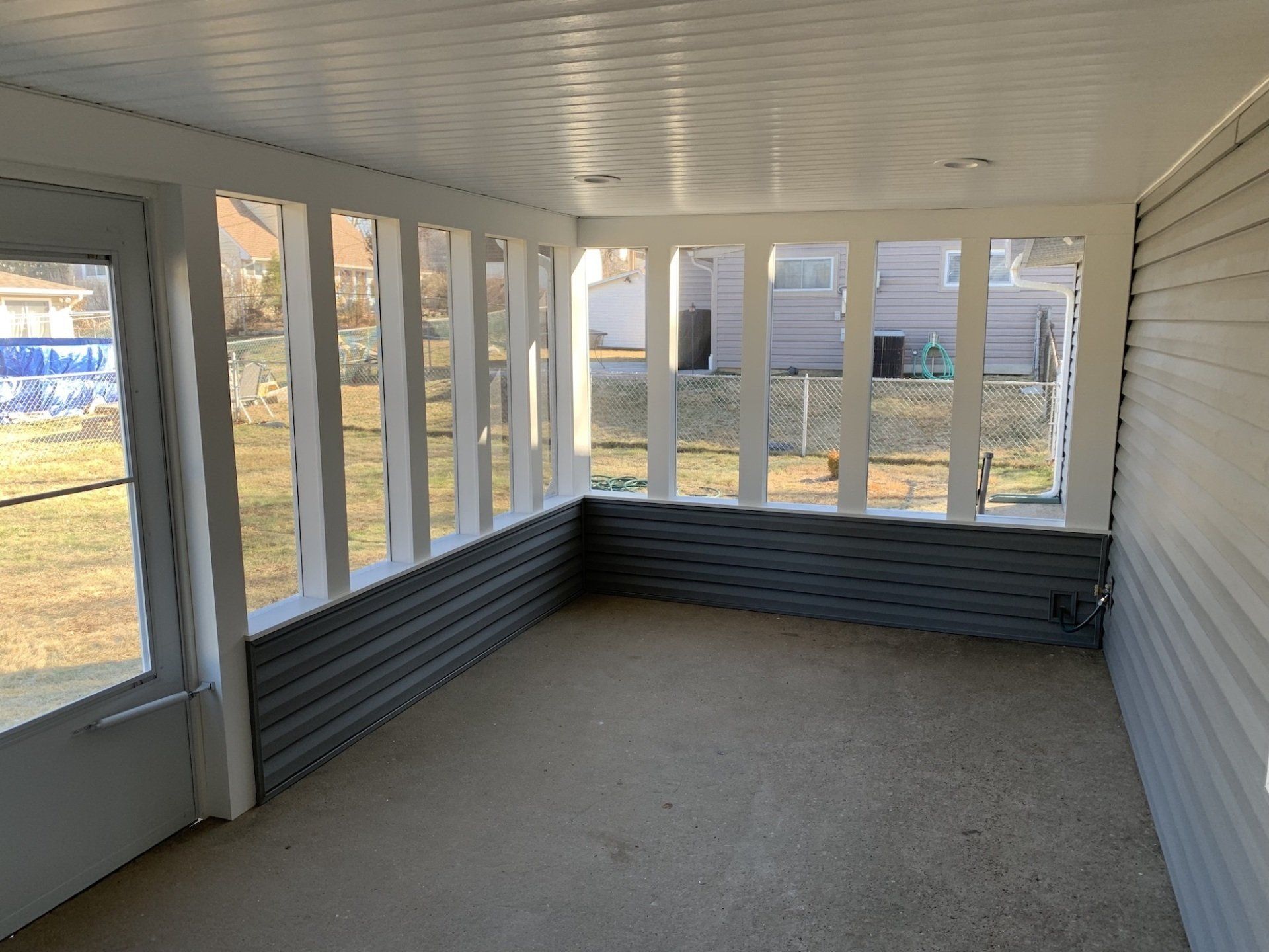 porch enclosure installation with windows