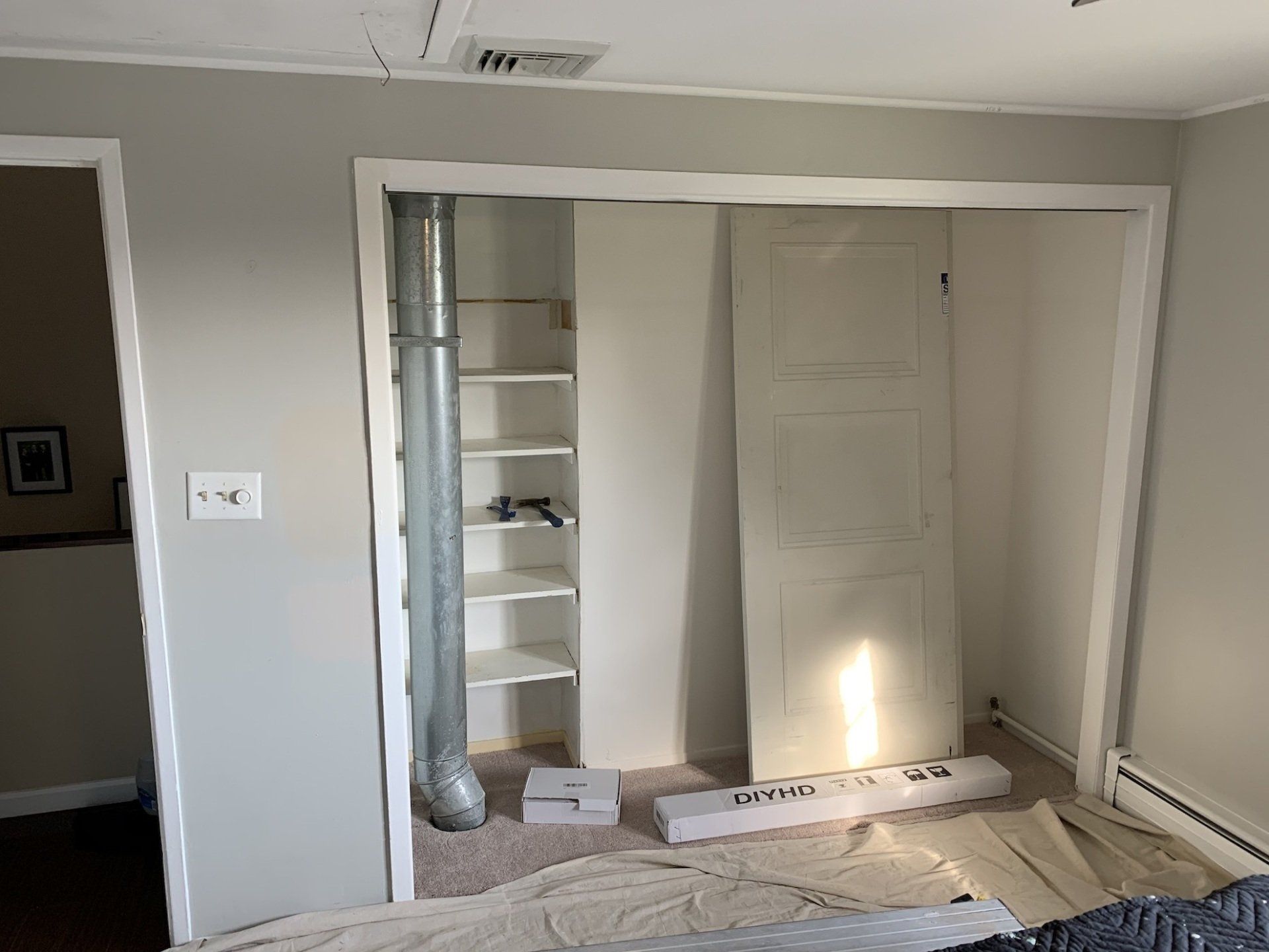 new closet door installation in progress