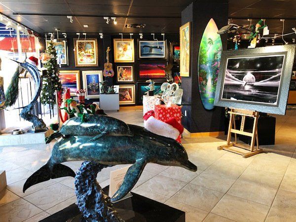 Artist Wyland Galleries - Dolphin Sculpture