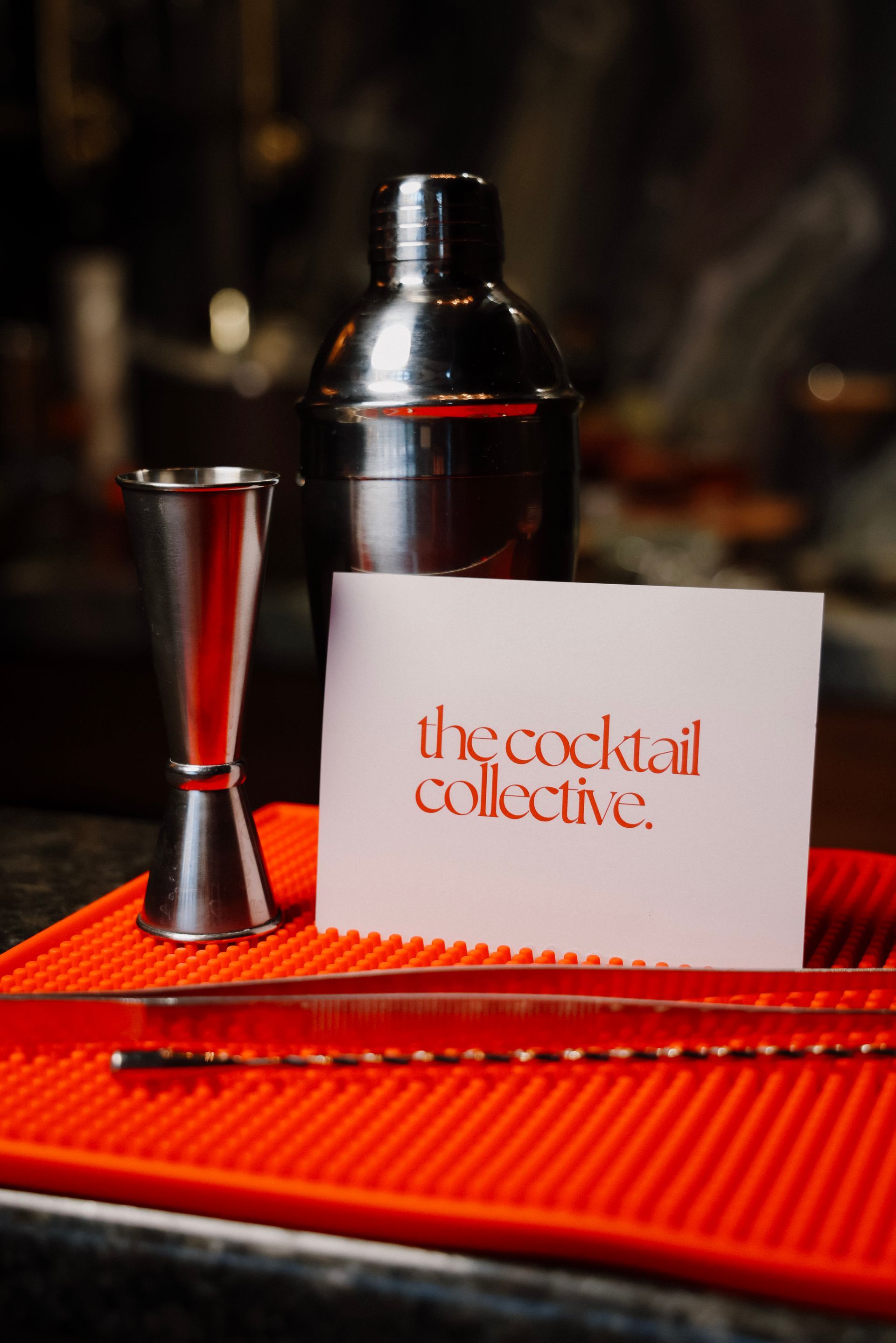 A card that says the cocktail collective on it