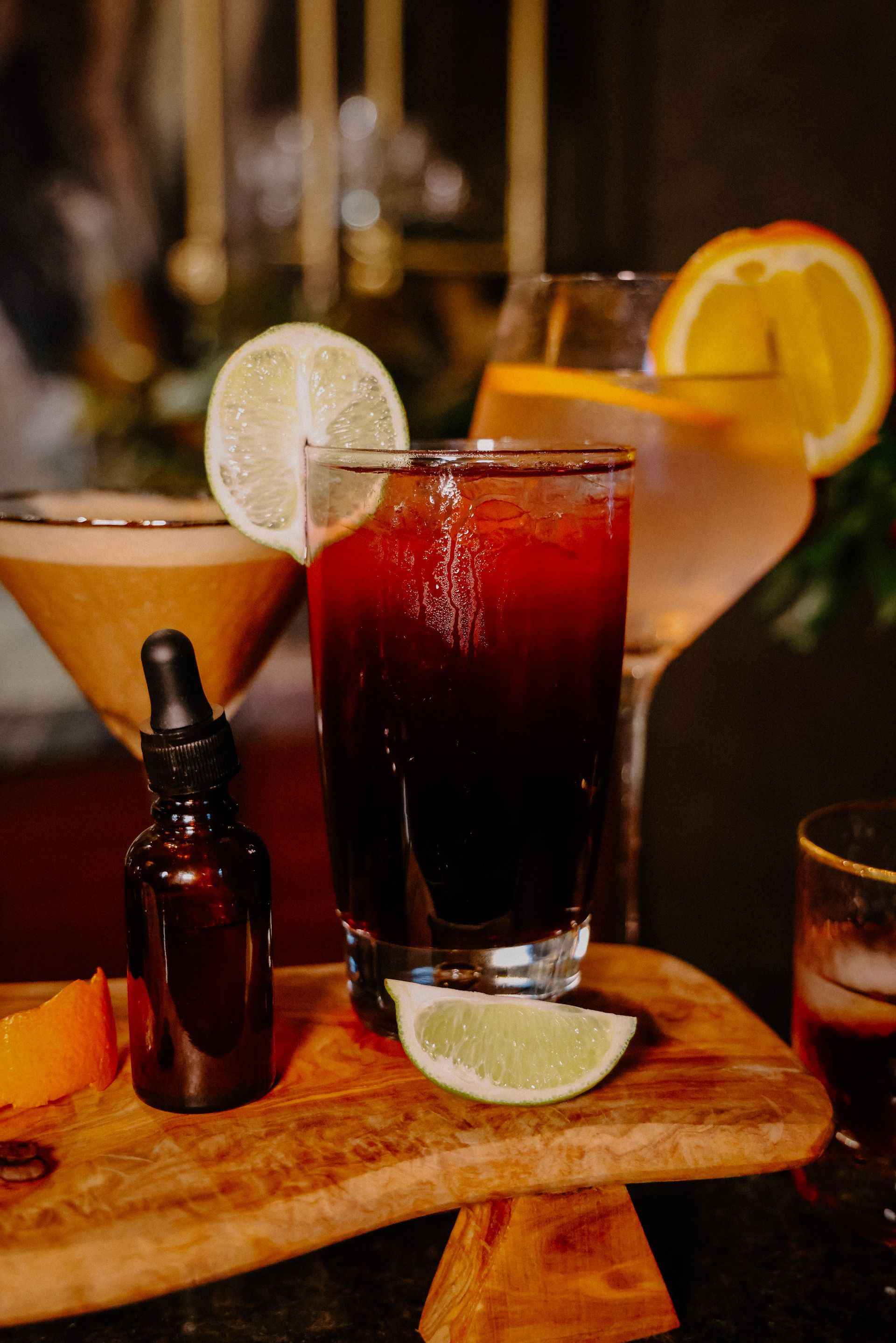 There are many different types of drinks on the table.