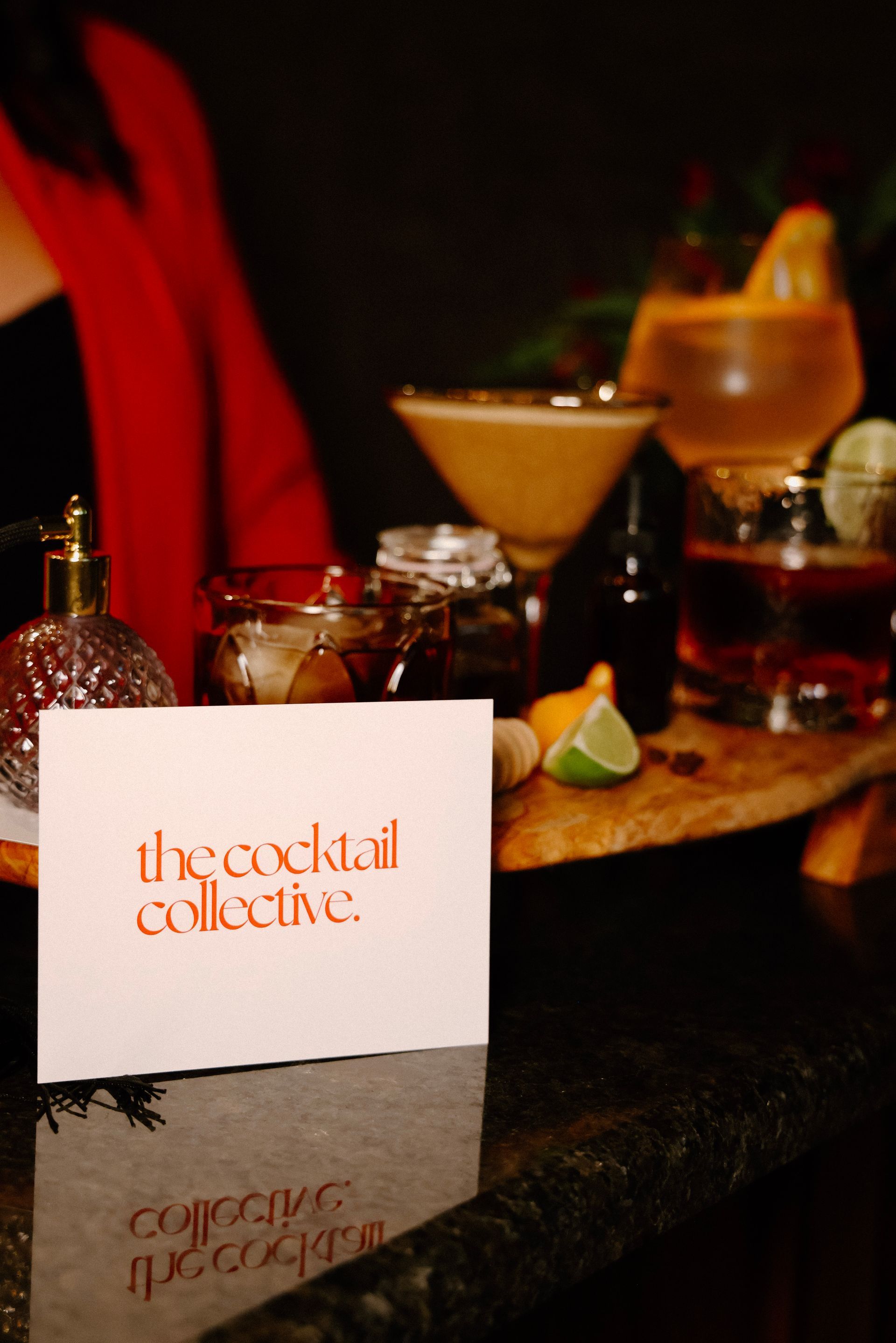 A card that says the cocktail collective on it