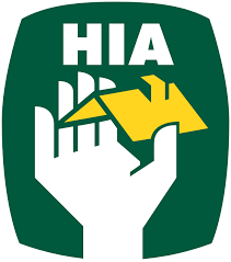 HIA logo: white hand holding a yellow house, green background with 