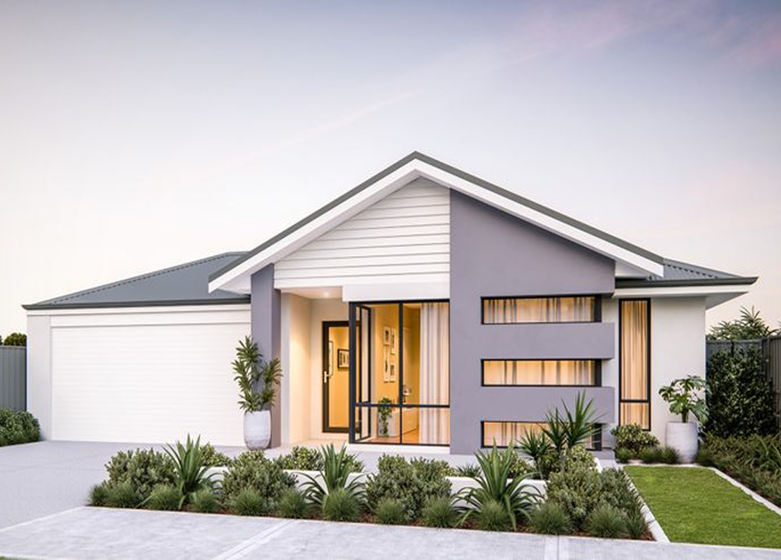 A large house with a brick driveway in front of it