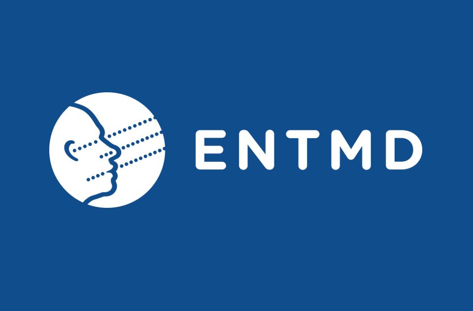 White version of ENTMB logo on navy blue