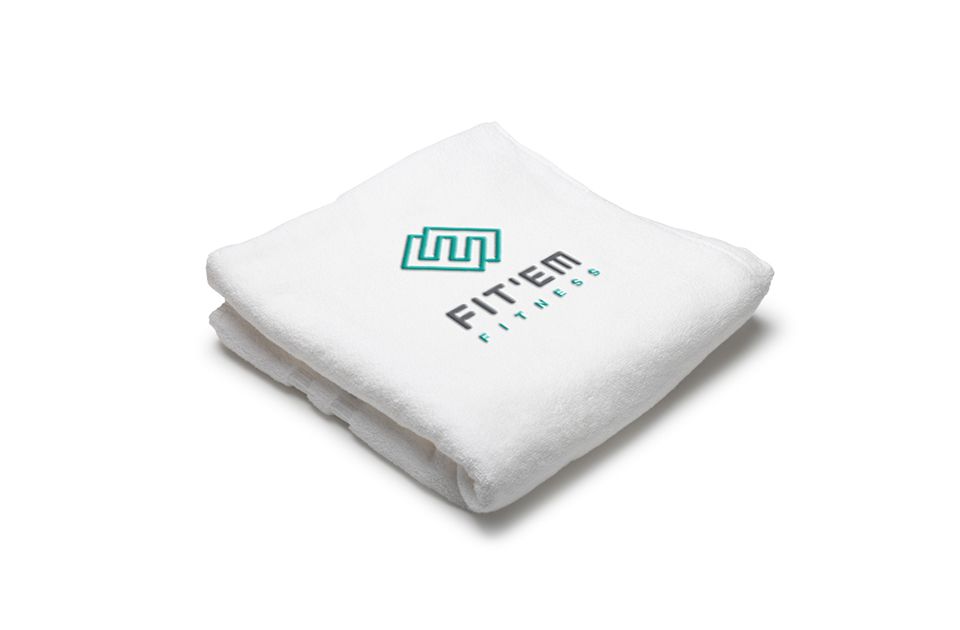 FIT’EM Fitness logo on a white towel