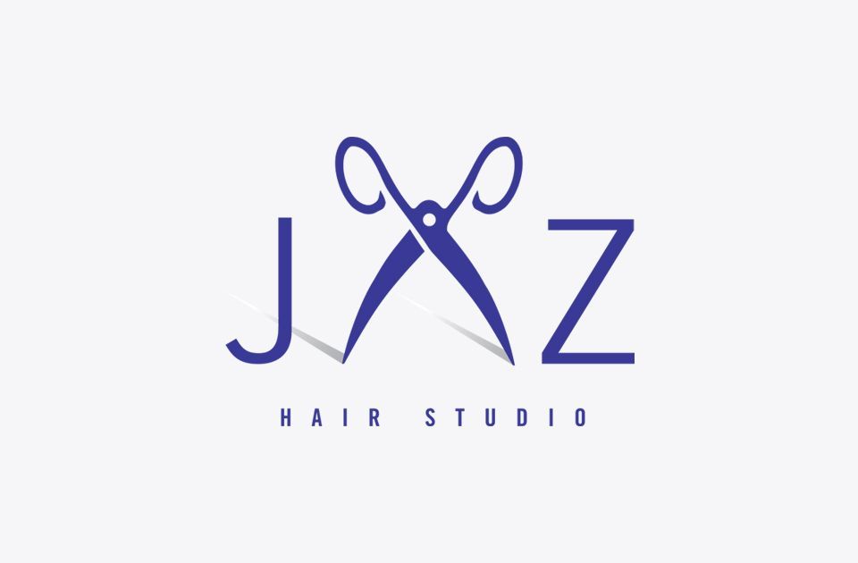 A blue logo for a hair studio where the A is replaced with a pair of scissors.