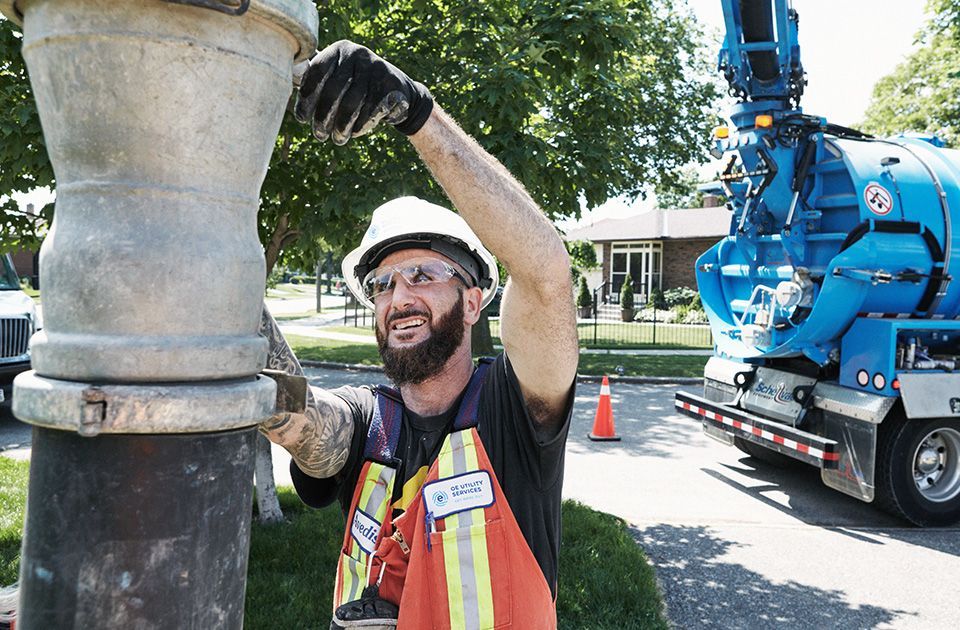 OE Utility Services worker using hydrovac