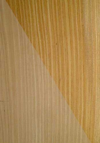 A close up of a piece of wood with a triangle in the middle.