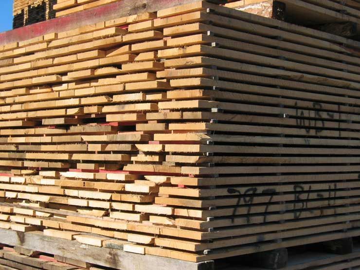 A stack of wooden boards with a few missing