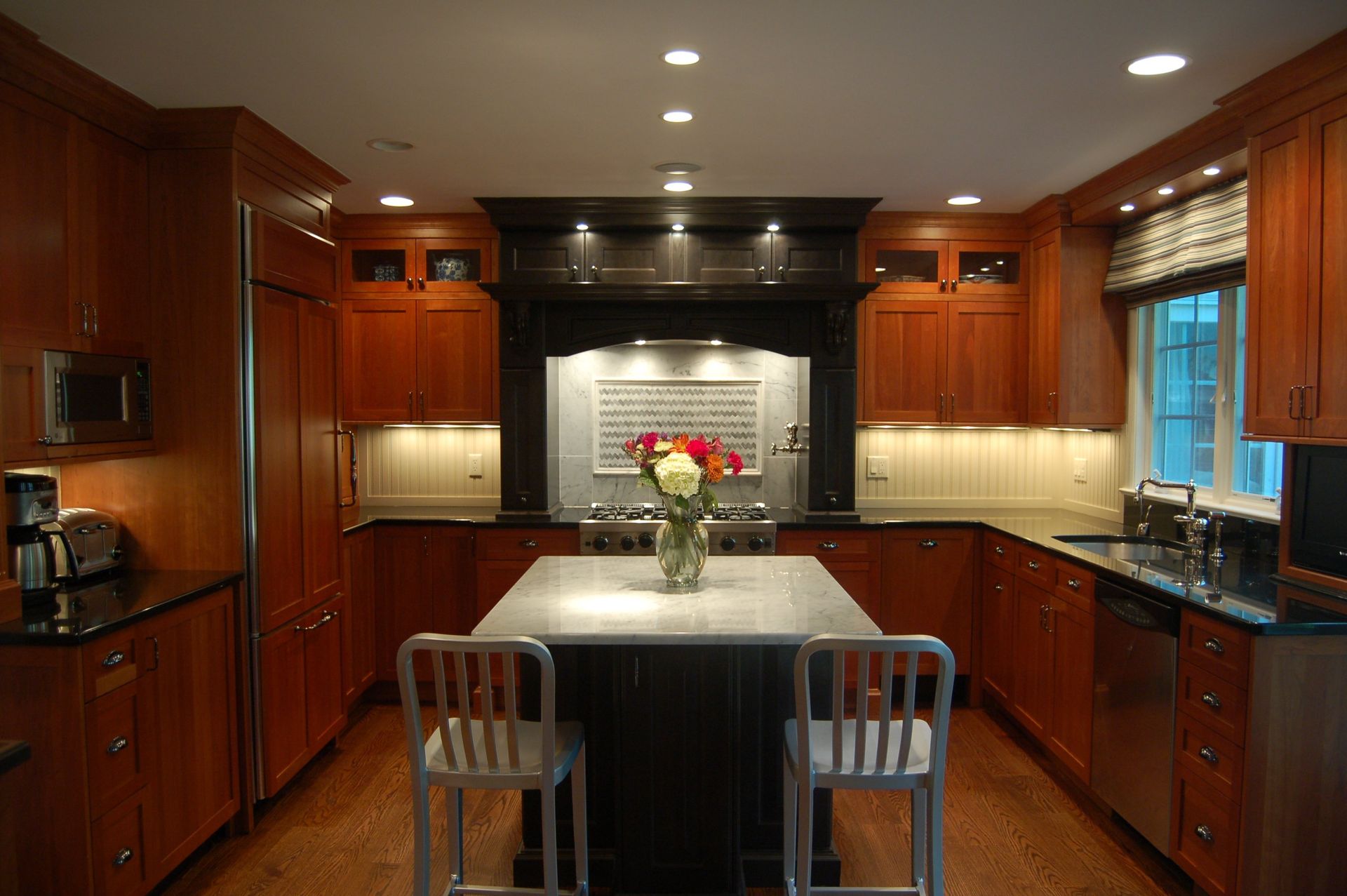 Updated kitchen with dark wooden cabinets