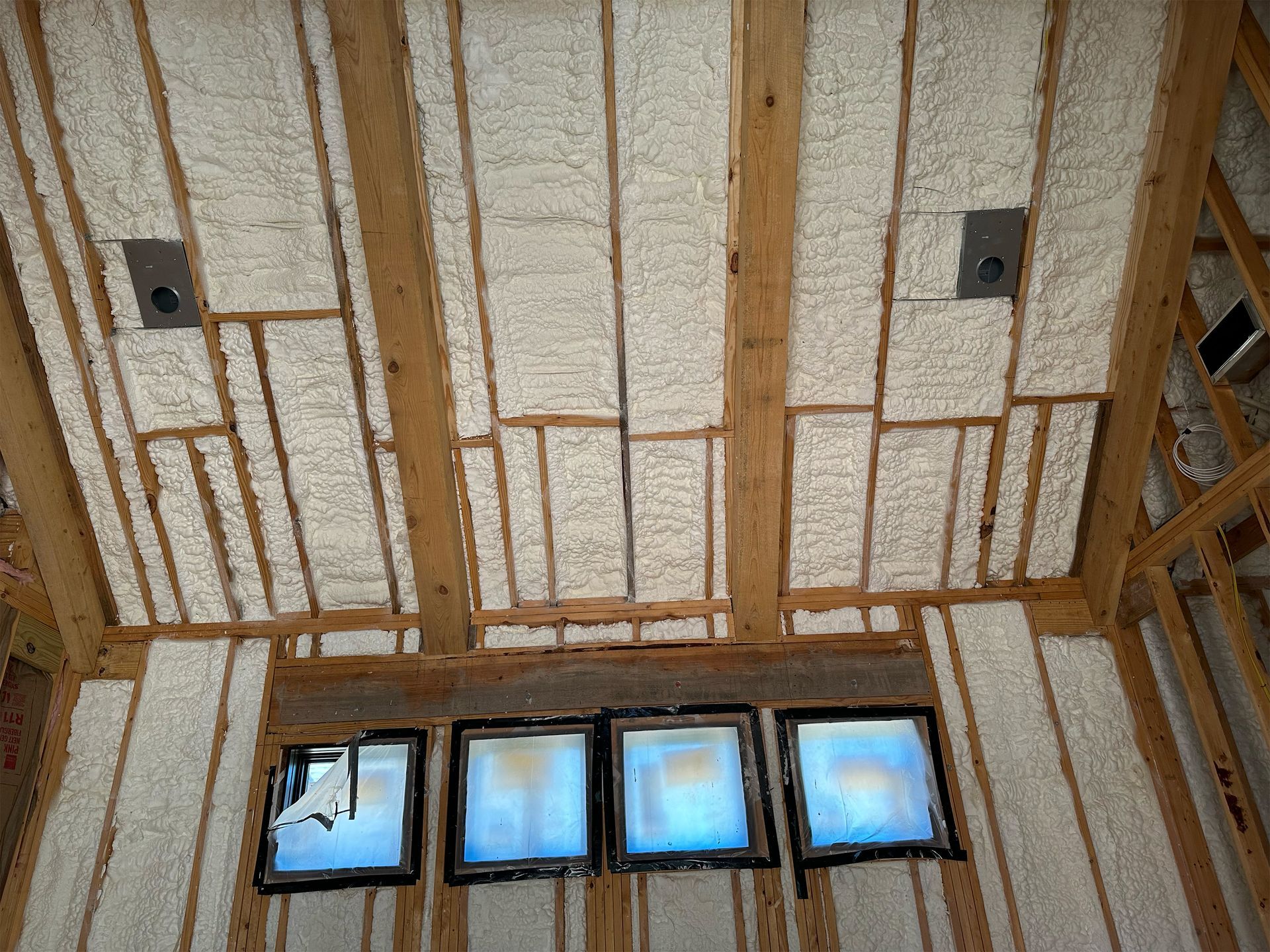 A room with a lot of insulation on the walls and ceiling.